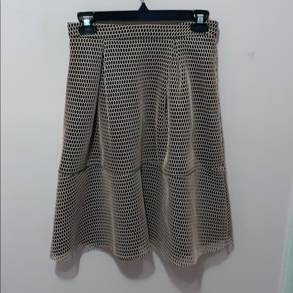 Light pink net like skirt wi hot pink zipper small